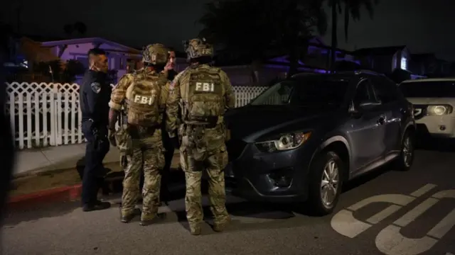FBI and other law enforcement teams search a property in Torrance, California, believed to be linked to the suspect