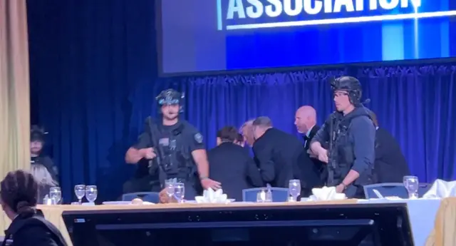 Security officials at the White House dinner after the shooting