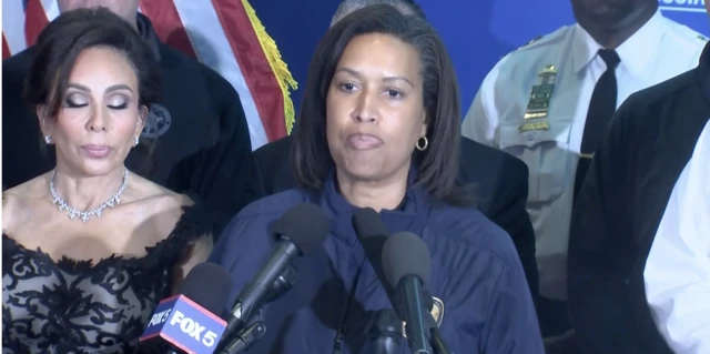 Washington DC Mayor Muriel Bowser gives an update to reporters