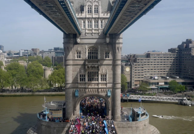 Runners crossing Tower Bridge