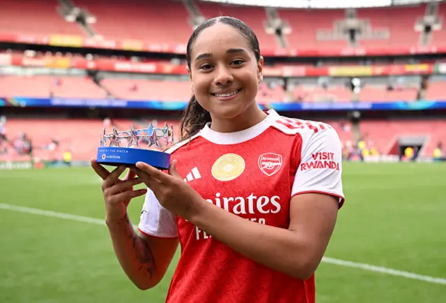 Olivia Smith of Arsenal poses for a photo with her Vodafone Player of the Match trophy
