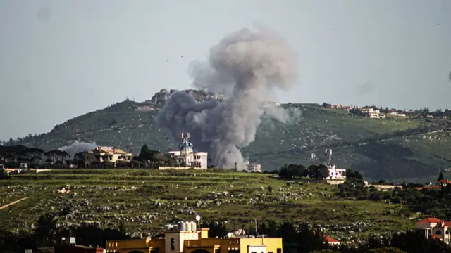 Smoke rises from targeted areas following an Israel airstrike in the town of Arnoun, in Lebanon's southern Nabatieh province on April 26, 2026.