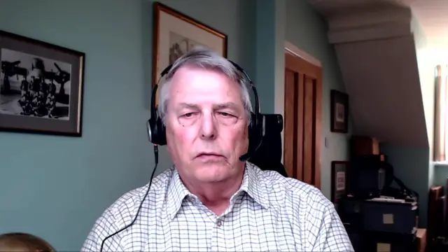 Bob Ayers talking to the BBC via a Zoom camera. He's in his house and wearing a checker shirt.
