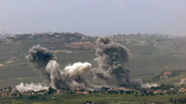 Israeli soldiers operate on the Lebanese side of the border, as seen from the Upper Galilee in northern Israel, 26 April 2026