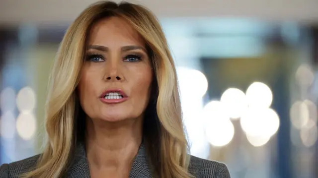 close-up of Melania Trump speaking, looking serious and angry