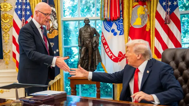 John Swinney and Donald Trump shake hands in the Oval Office