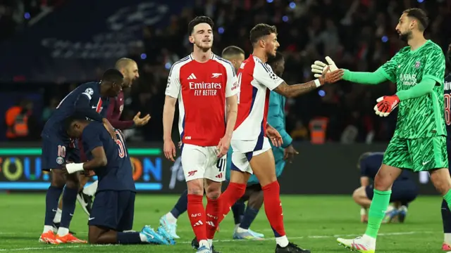 Paris St-Germain players celebrate winning their Champions League semi-final against Arsenal in 2025 as goalkeeper Gianluigi Donnarumma offers his commiserations