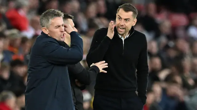 Tonda Eckert argues with Kieran McKenna