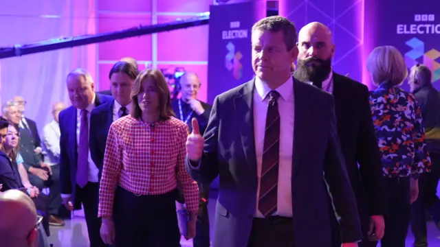 The leaders leave the stage