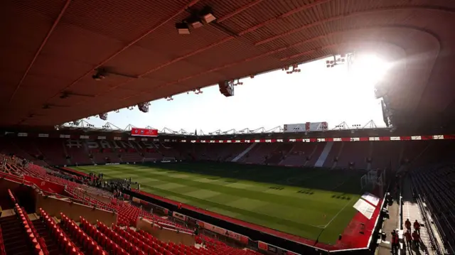 The sun shines into an empty St Mary's before their game against Ipswich
