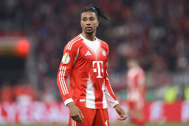 Michael Olise looking on