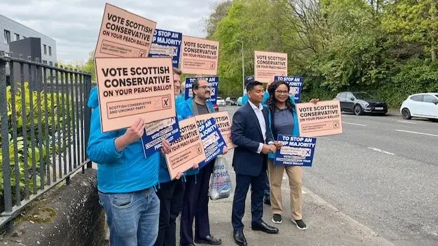 Tory activists outside hospital