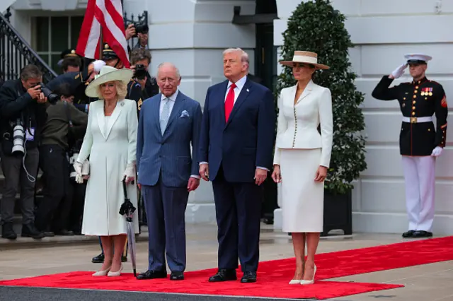 Camilla, the King, Donald Trump and Melania Trump standing outside the White House