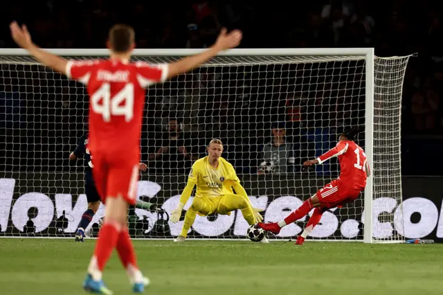 Michael Olise shoots but Paris Saint-Germain's Russian goalkeeper Matvey Safonov makes the save