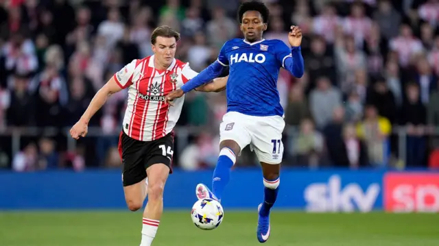 Jaden Philogene skips past Southampton's James Bree