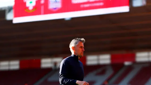 Kieran McKenna on the St Mary's pitch before kick-off