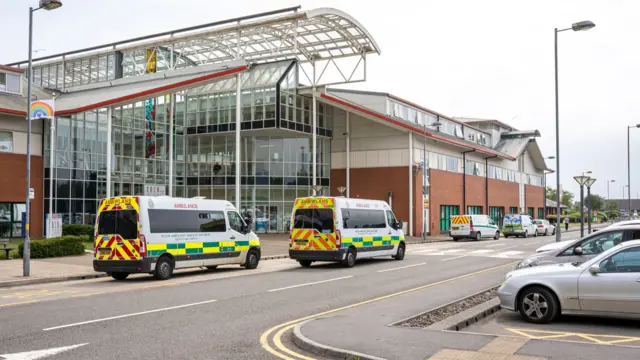Ambulances parked outside a hospital