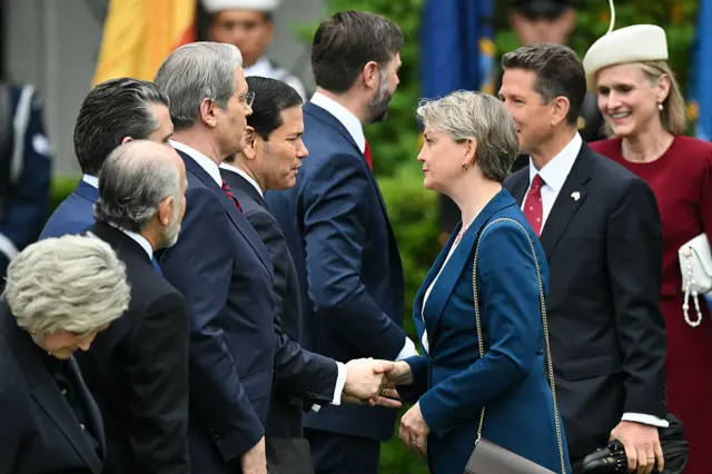 US Secretary of State Marco Rubio shakes hands with UK Foreign Secretary Yvette Cooper