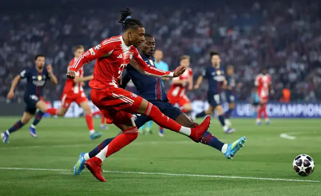Michael Olise of FC Bayern Munich takes a shot