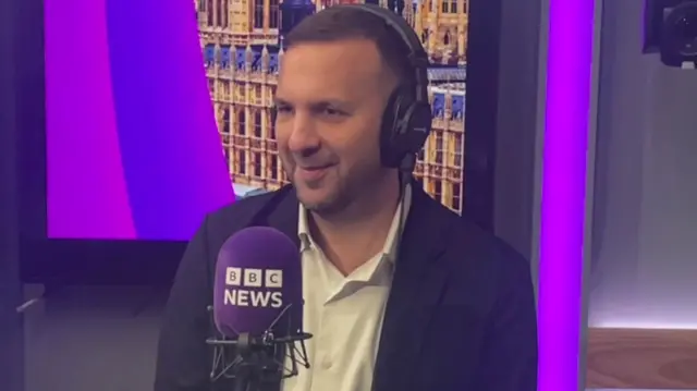 Green party leader Zack Polanski in a radio suite.