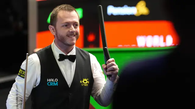 Mark Allen celebrates
