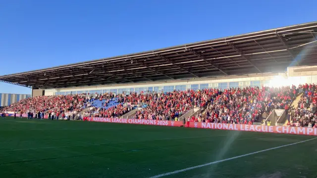 A football stand filled with fans
