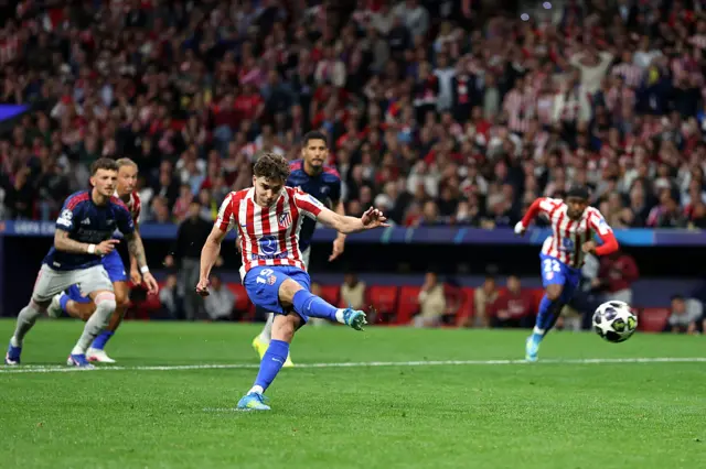 Julian Alvarez scores a penalty