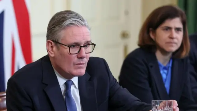 Sarah Sackman sits next to Keir Starmer