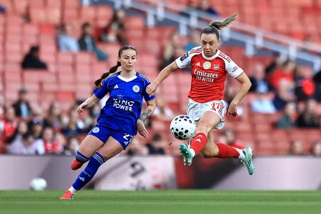 Katie McCabe of Arsenal and Hannah Cain of Leicester