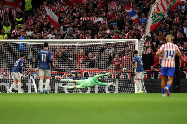 David Raya makes a diving save to deny Julian Alvarez