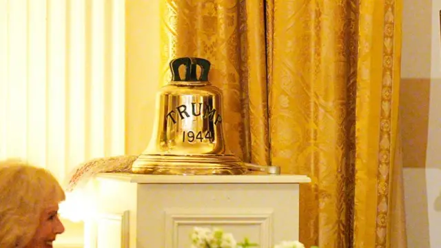 A golden bell from HMS Trump