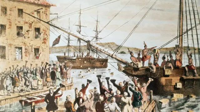 An illustration of the "Boston Tea Party" event. Crowds watch as tea crates are thrown into the harbour
