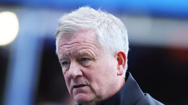Sheffield United boss Chris Wilder looking on.