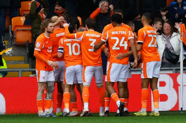 Blackpool celebrate their opening goal against Exeter