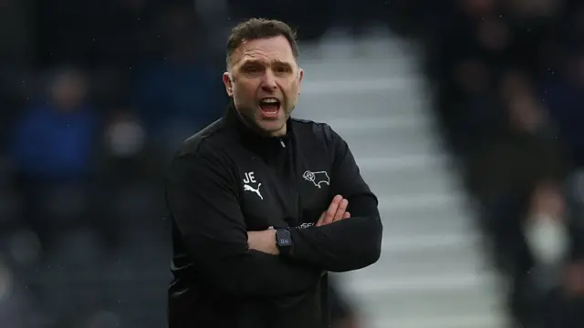 Derby boss John Eustace folded arms shouting