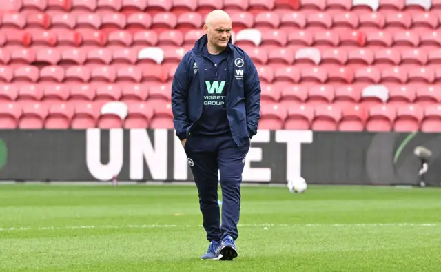 Alex Neil walks on the pitch at the Riverside