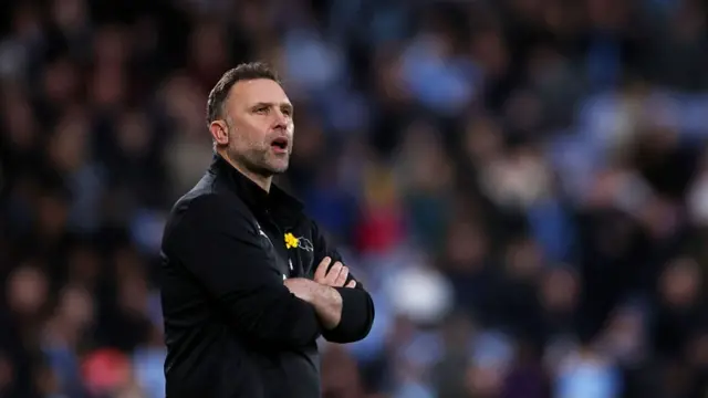 Derby head coach John Eustace looks to the skies