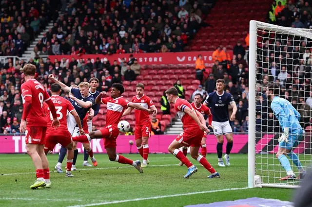 Josh Coburn volleys Millwall level at Middlesbrough