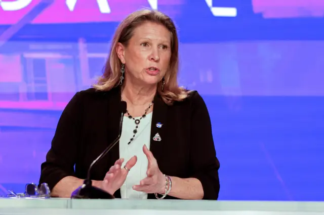 Lori Glaze is seen at a news conference offering updates the Artemis II mission