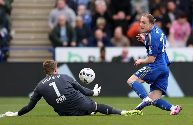 Daniel Iversen of Preston saves from Leicester's Oliver Skipp