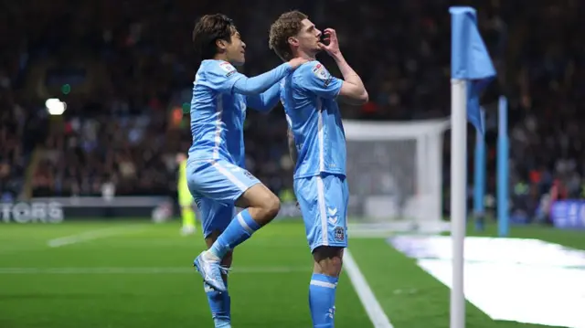 Jack Rudoni celebrates in front of the Coventry fans