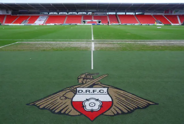 A general view of Doncaster's Eco-Power Stadium with the club badge printed on astro turf around the pitch