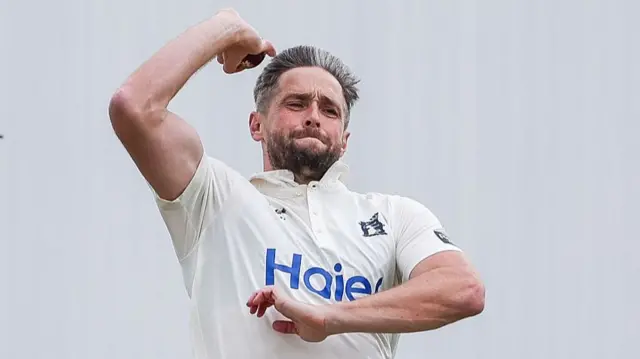 Chris Woakes at the end of his bowling run-up in pre-season