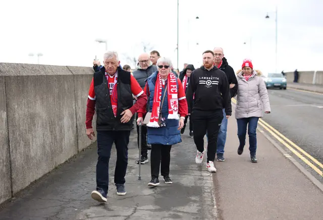 Middlesbrough fans walk towards the Riverside Stadium