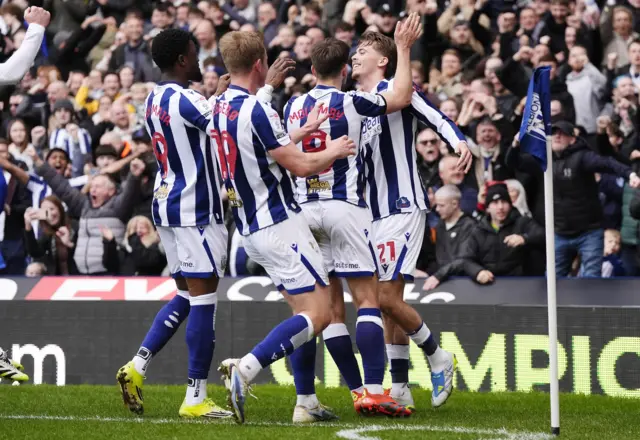 West Brom celebrate their opening goal against Wrexham