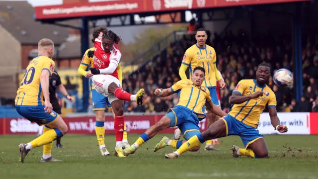 Arsenal and Mansfield players