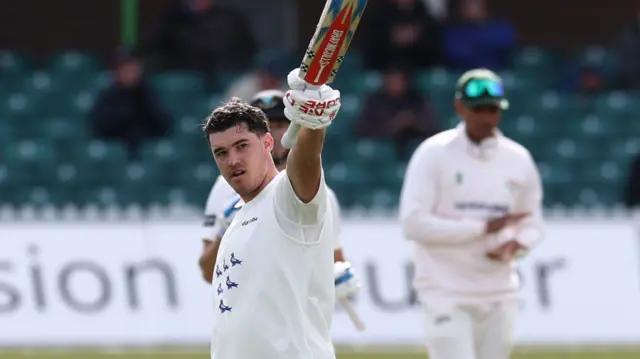 Tom Clark reaches his century