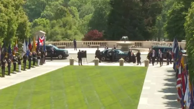 motorcade arriving at cemetery