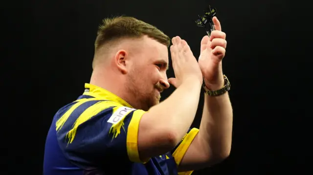 Luke Littler celebrates victory after his semi-final match against Gerwyn Price on night thirteen of the BetMGM Premier League 2026 at P&J Live, Aberdeen