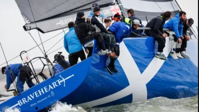 Malcolm Offord's boatt with crew on rough seas